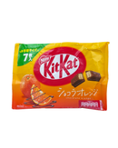 Japanse KitKat chocolade sinaasappel mini’s in oranje verpakking met citrusfruit en chocolade

