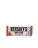 Verpakking van Hershey’s chocolade met koekstukjes en gezouten karamel in witte en oranje wikkel

