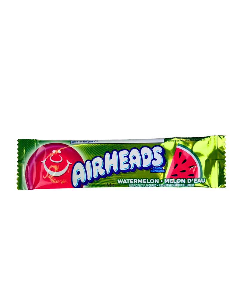 Groene verpakking van Airheads met watermeloen smaak en vrolijk lachend gezichtje